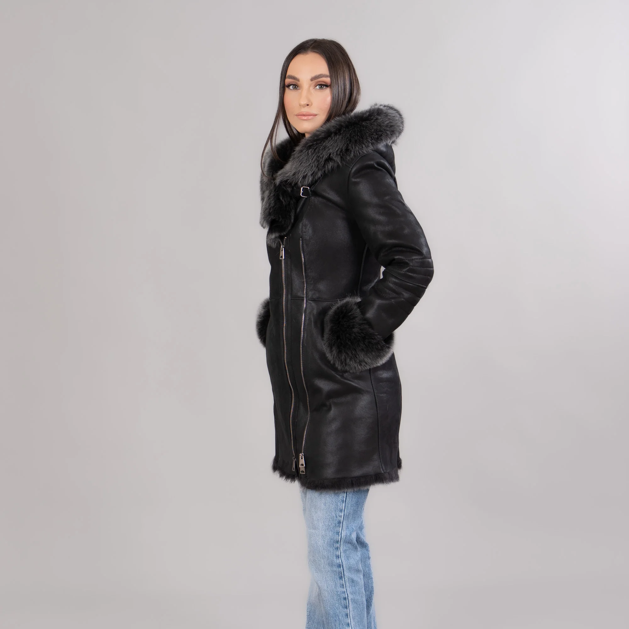 Black sheepskin coat with a hood