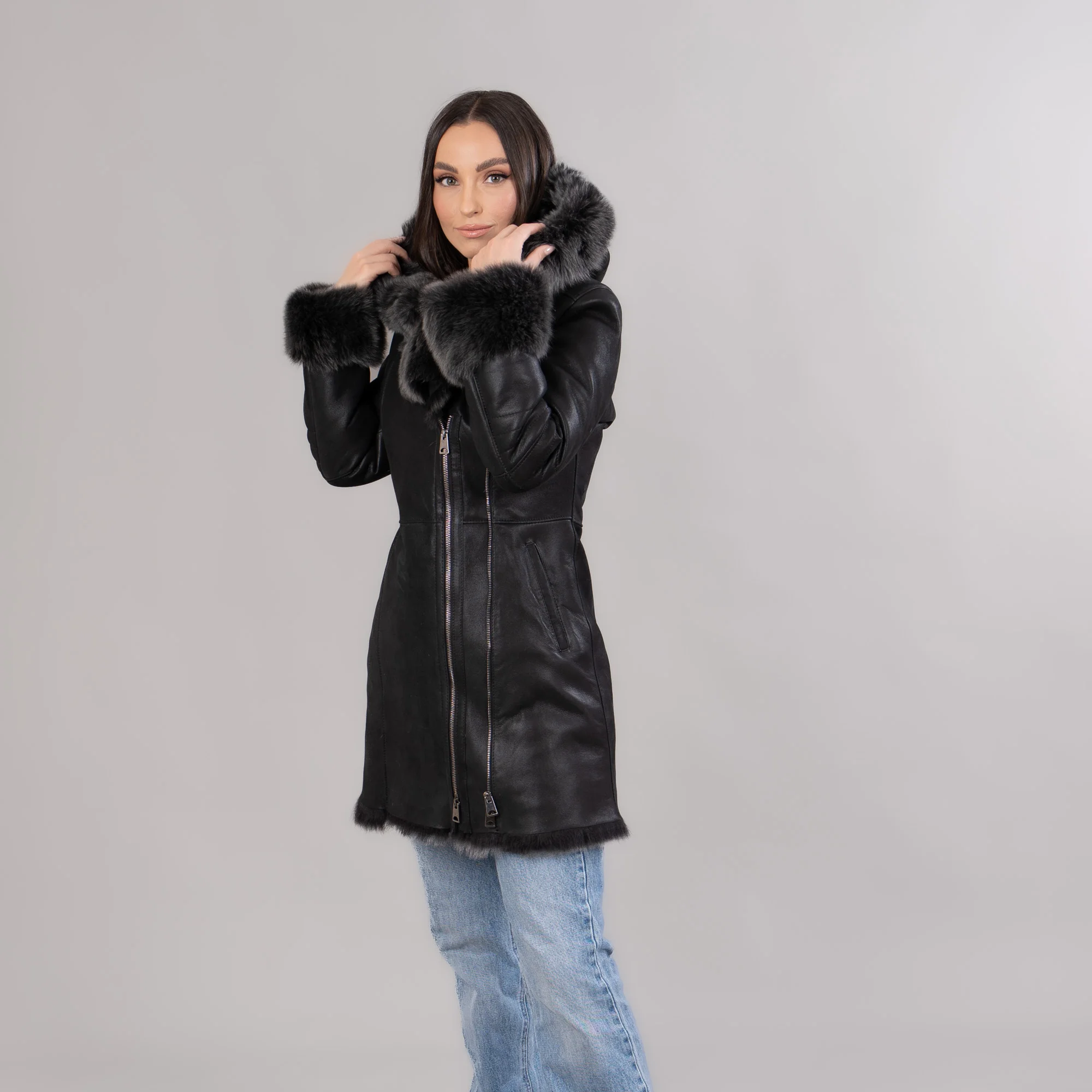 Black sheepskin coat with a hood