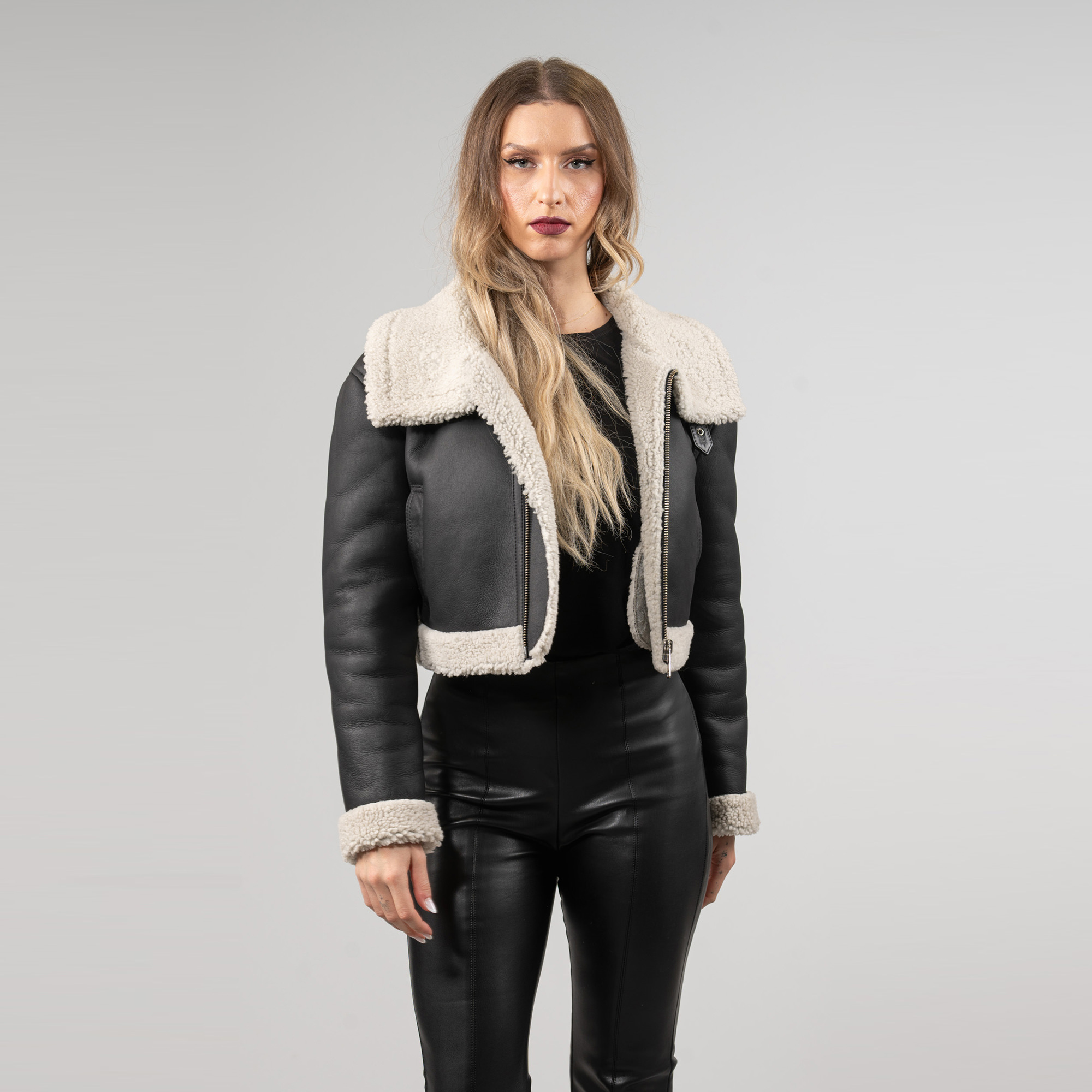 Sheepskin jacket with a collar in black color