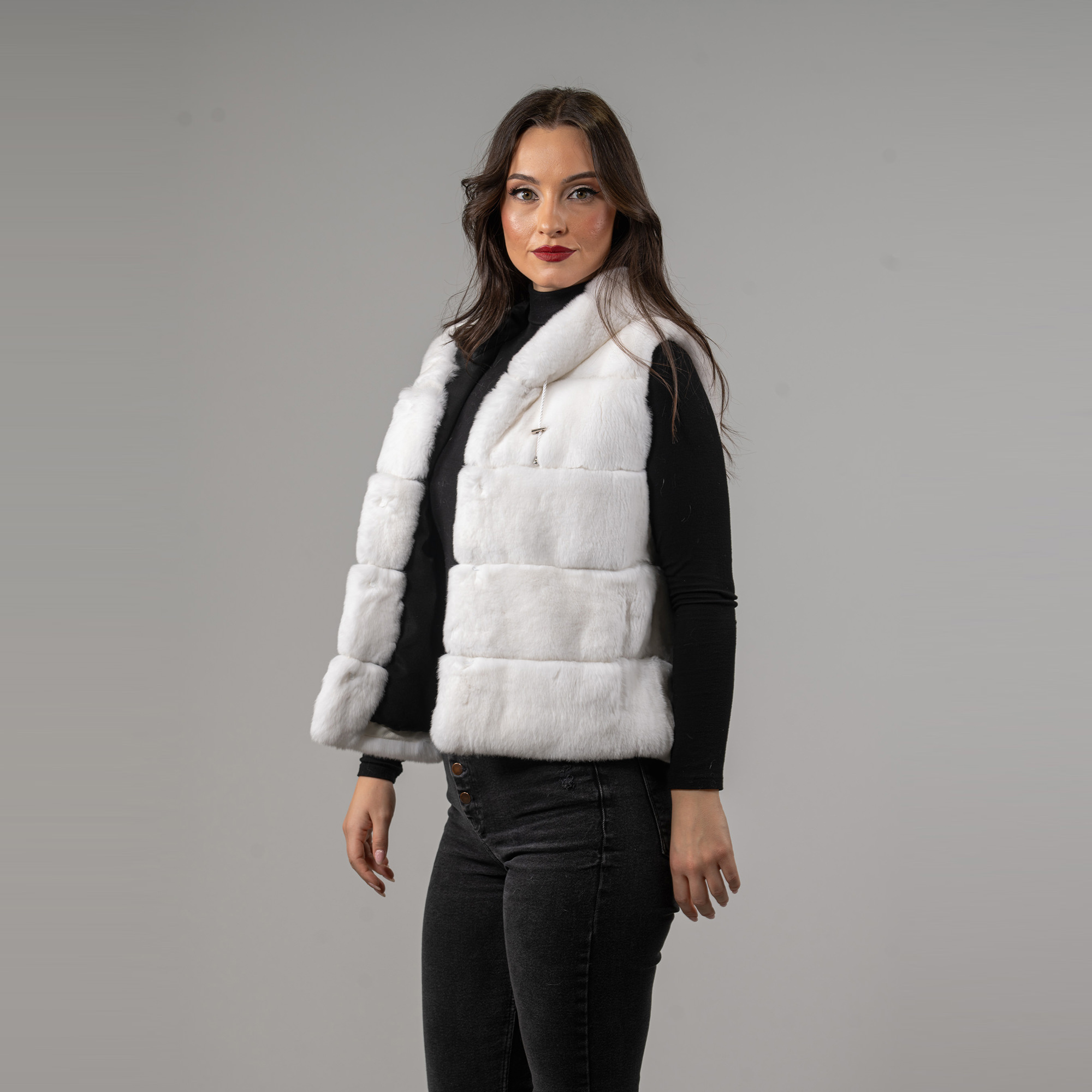 Rabbit fur vest with a hood in white color