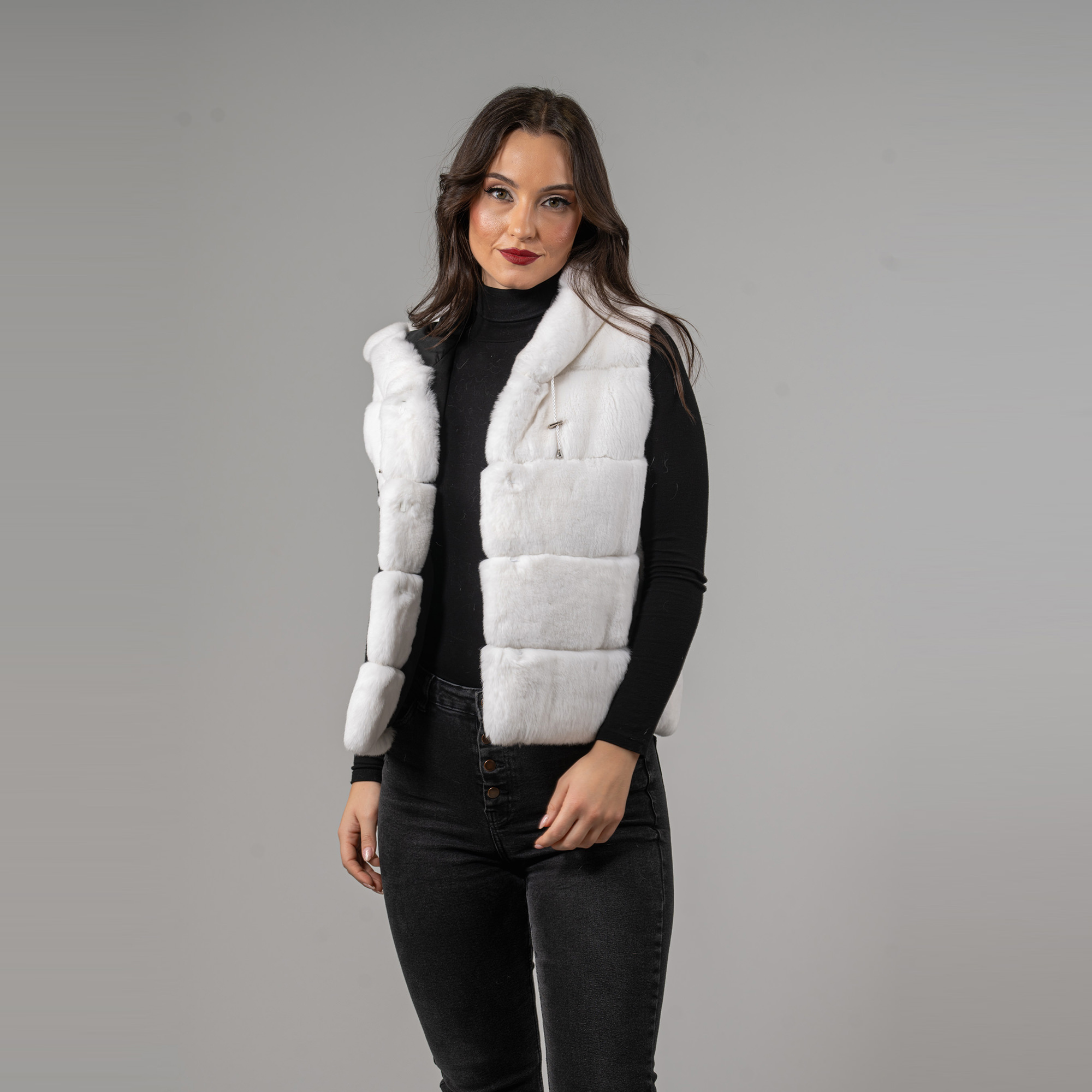 Rabbit fur vest with a hood in white color