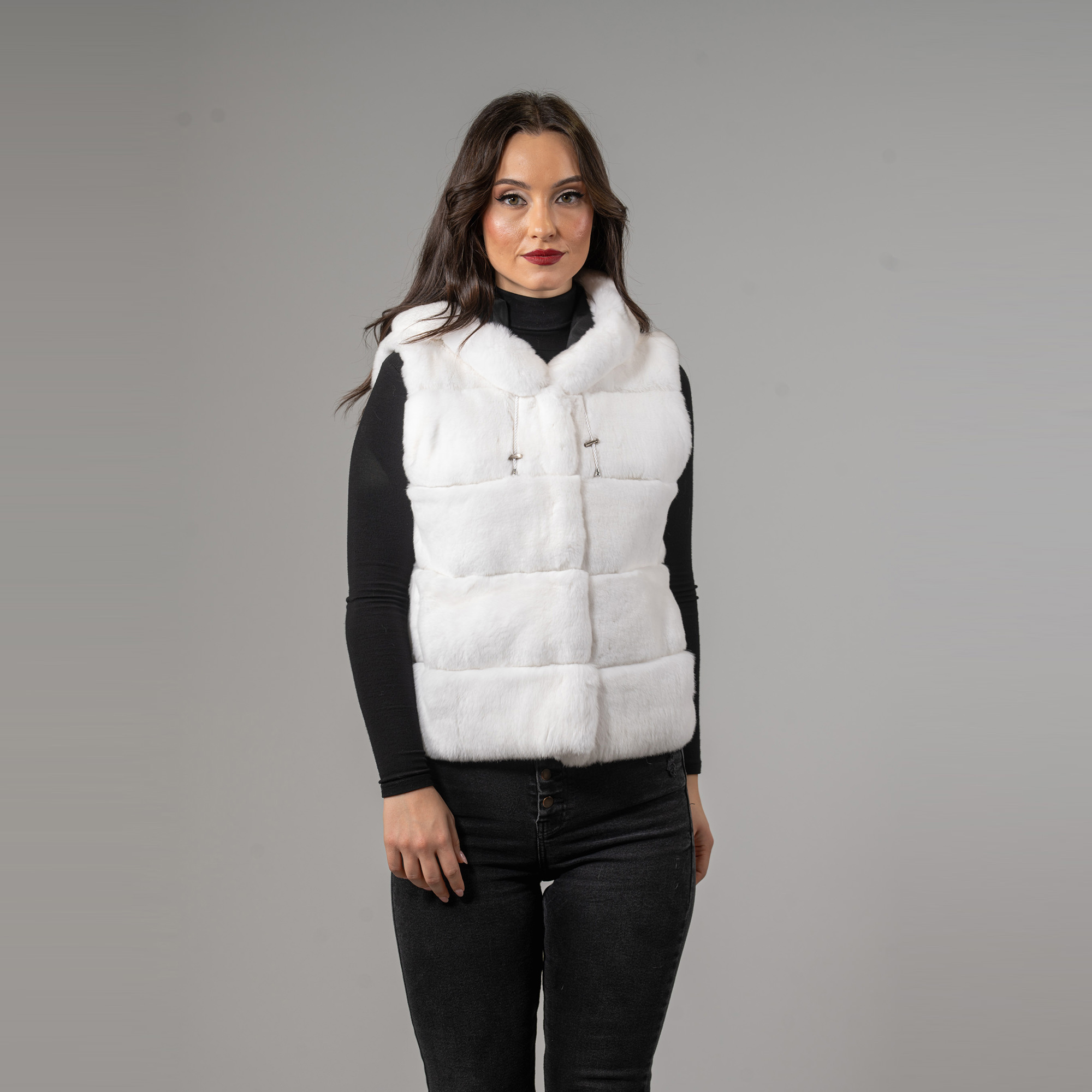 Rabbit fur vest with a hood in white color