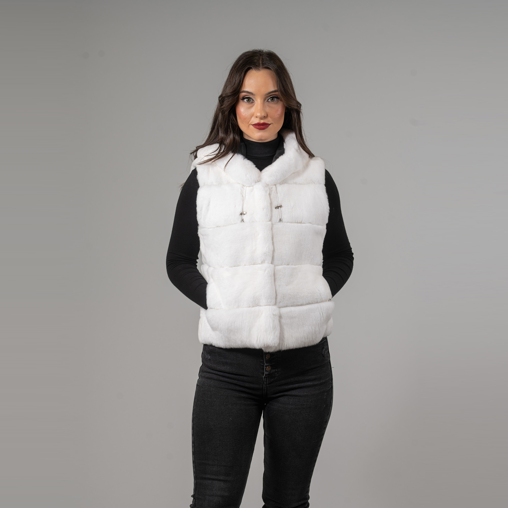 Rabbit fur vest with a hood in white color